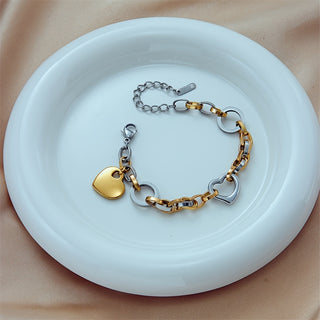 Edelstahl-Armband mit Herzanhänger im Zweifarbiges Design