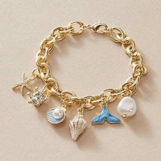 Elegantes Armband im Ozean-Stil mit goldfarbenen Charms