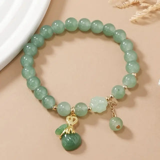 Elegantes Glücksgeldbeutel & Kleeblatt Perlenarmband